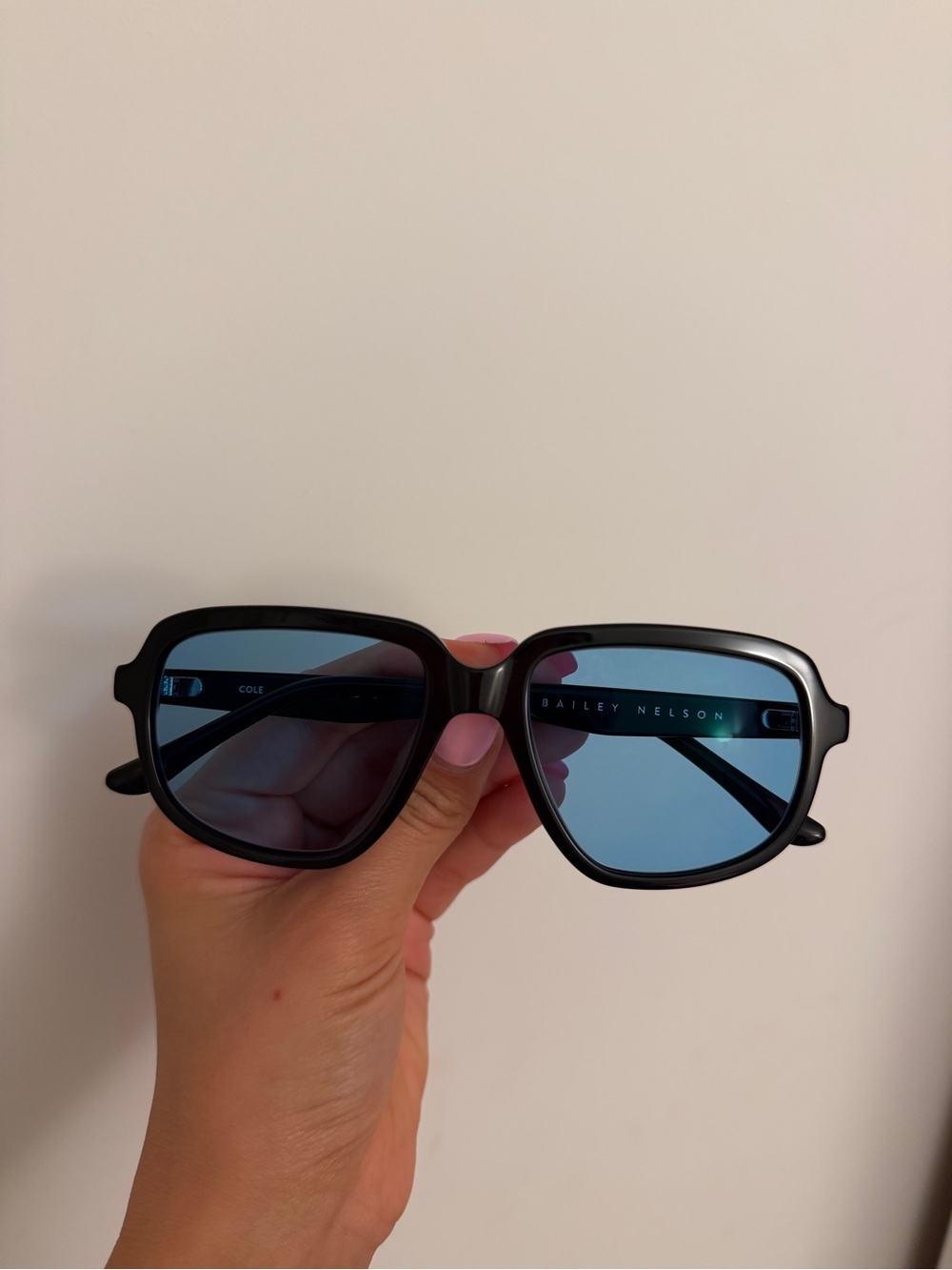 Bailey Nelson Women’s Black Frame Sunglasses with Blue Lenses